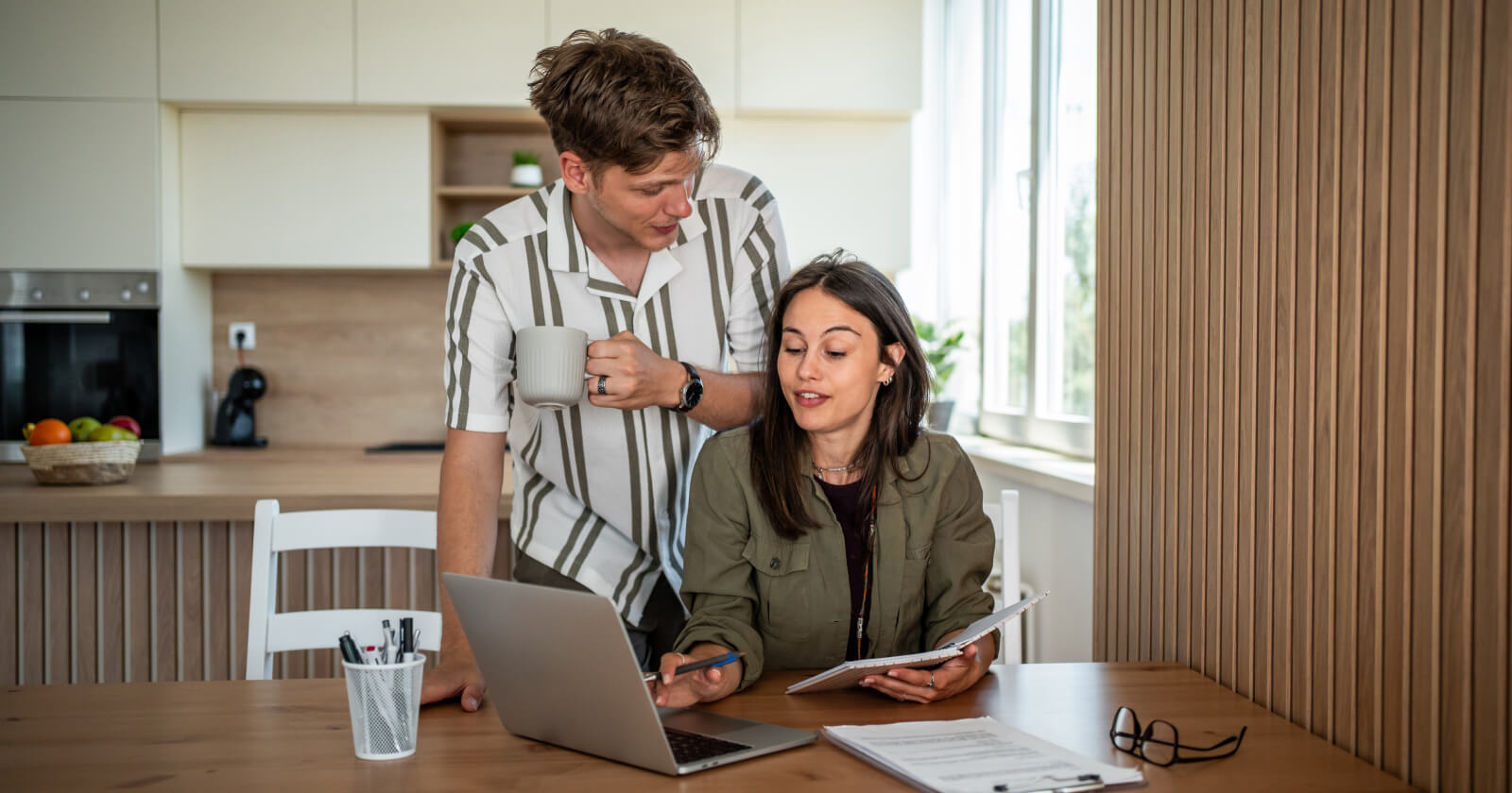 Homebuyers reviewing estimated cash to close for a low-down-payment mortgage